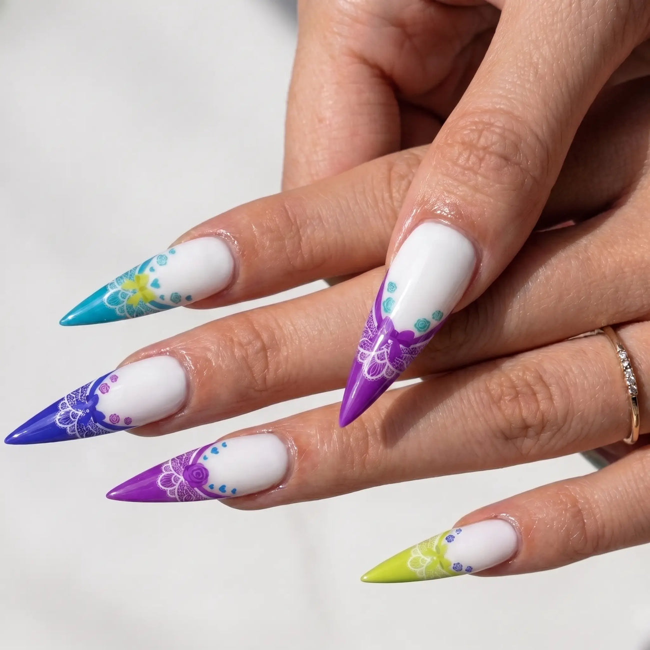 long glossy stiletto french tip press on nails worn look, colorful lace