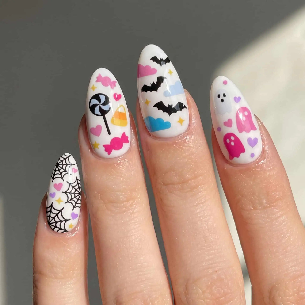 pastel ghosts, candy, and black cat halloween press on nails detail, handmade glossy finish