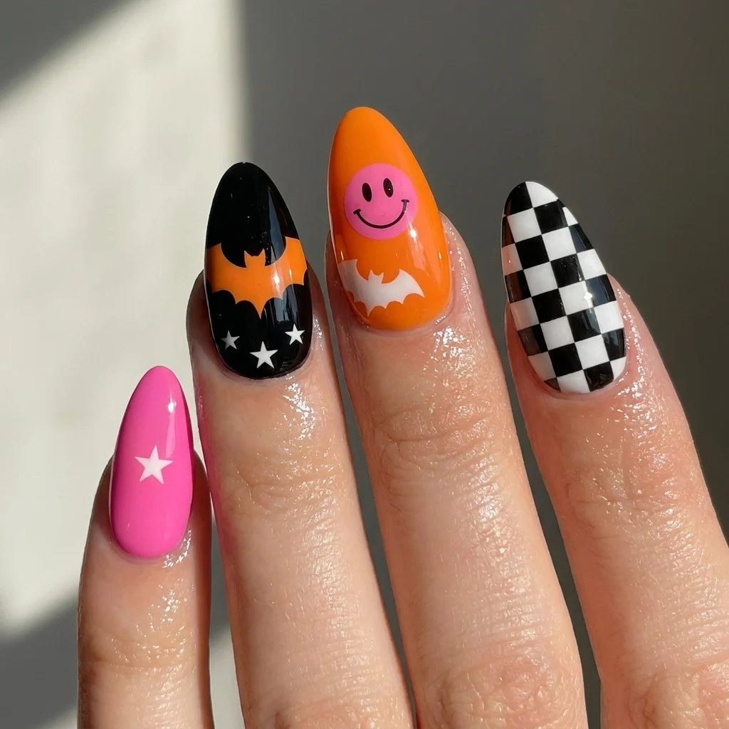 Bat Bolt short almond press-on nails worn on hand — bats, lightning, checkerboard, and a smiling orange accent