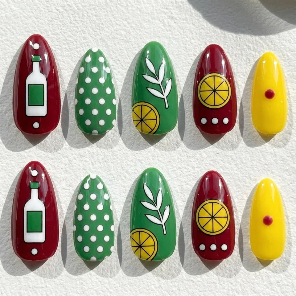Citrus Spritz short almond press-on nails — citrus slices, green leaves, dots, and bottle-inspired art