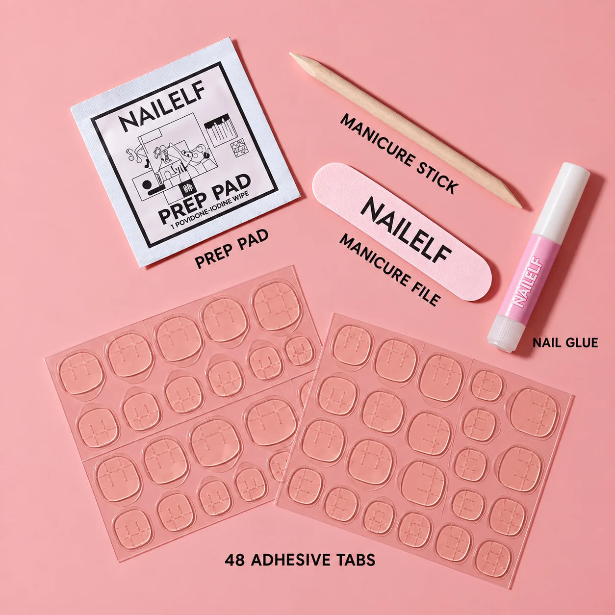 nailelf accessory kit included with vampire kiss almond — nail glue, prep pad, manicure stick, nail file and adhesive tabs