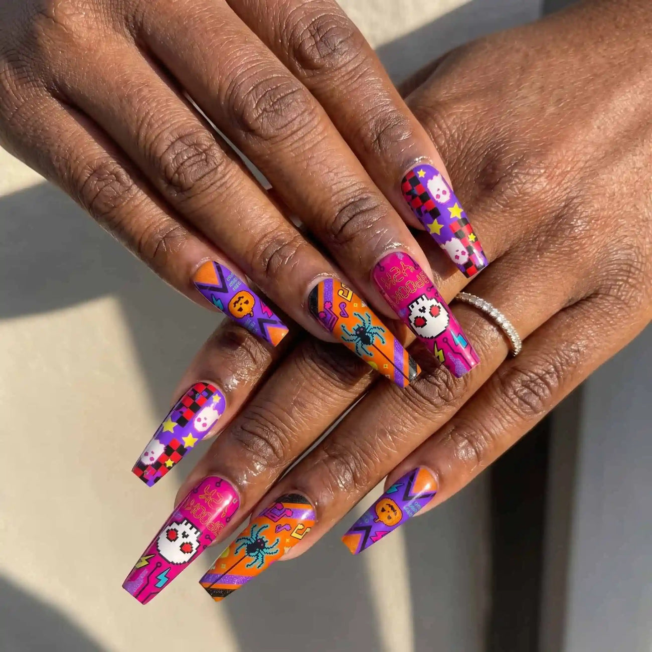 neon pumpkins, skulls, spiders, and lightning halloween press on nails detail, handmade glossy finish