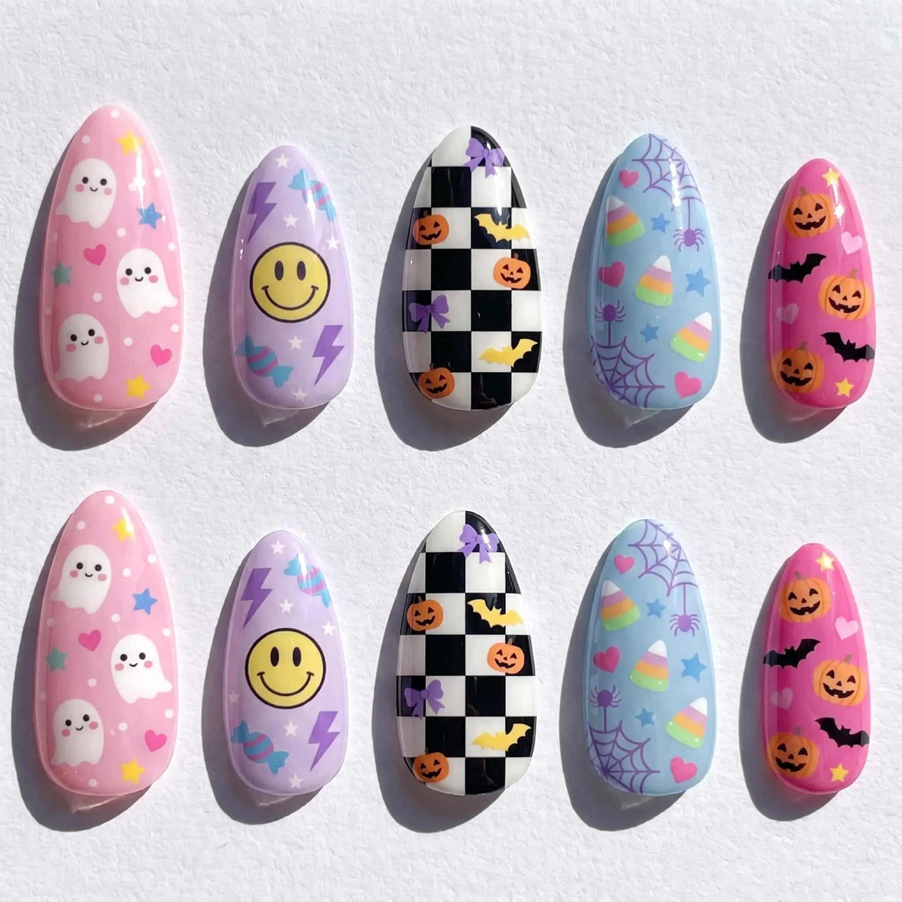 pastel ghost and pumpkin halloween almond press on nails — spooky season design
