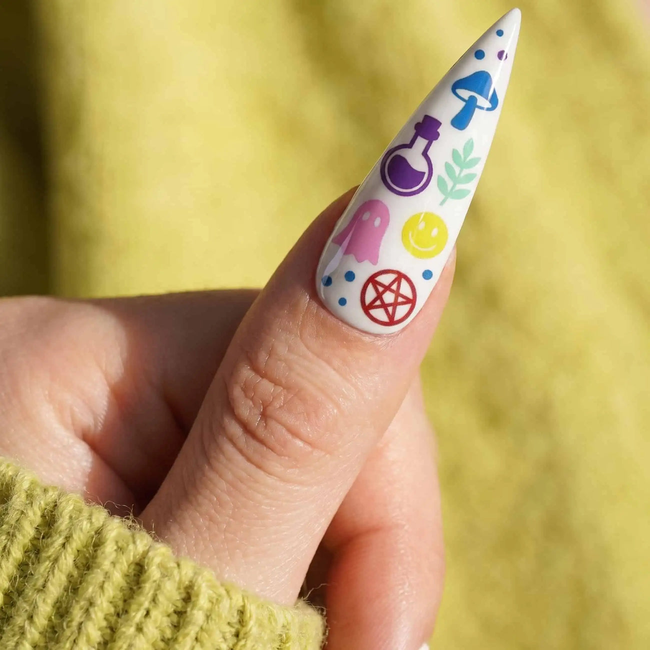 halloween stiletto press on nails worn look, pastel potions, ghosts, mushrooms, and pentagrams