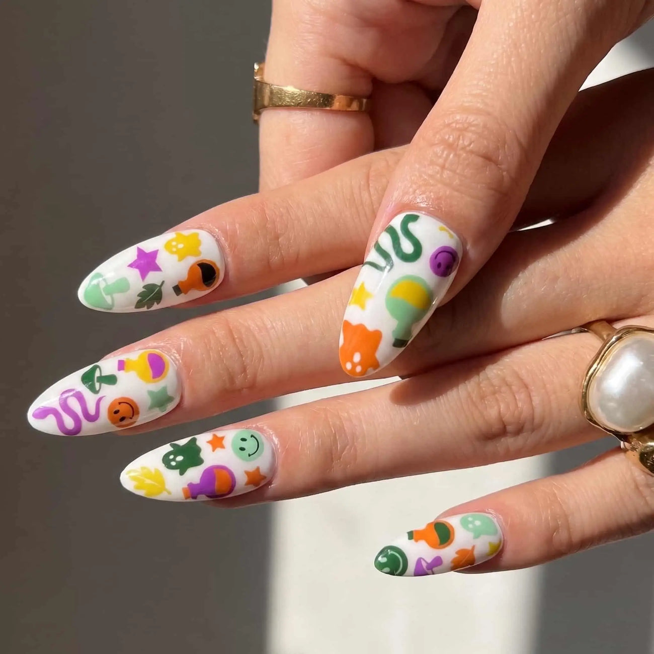 pastel snake, ghost, and pumpkin halloween press on nails detail, handmade glossy finish