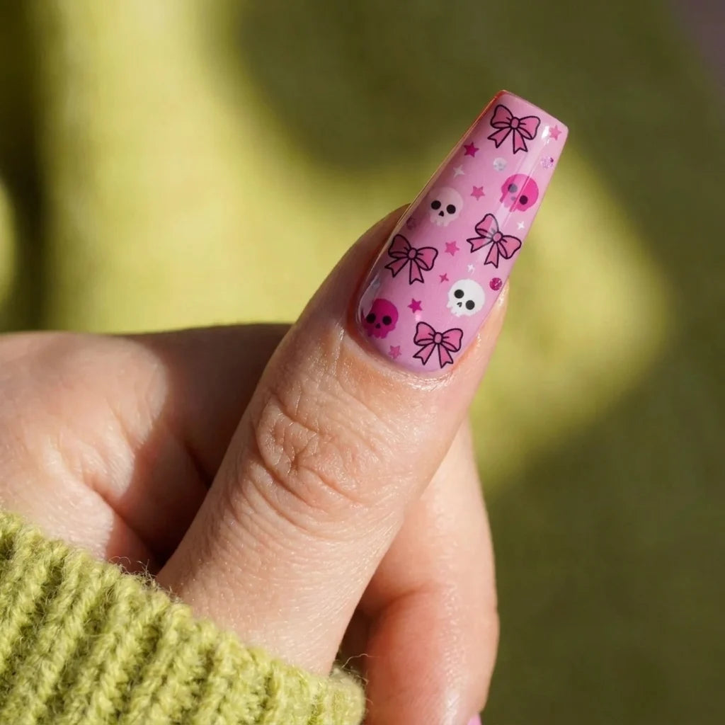 halloween coffin press on nails worn look, pink candy corn, ghosts, hearts, and bows