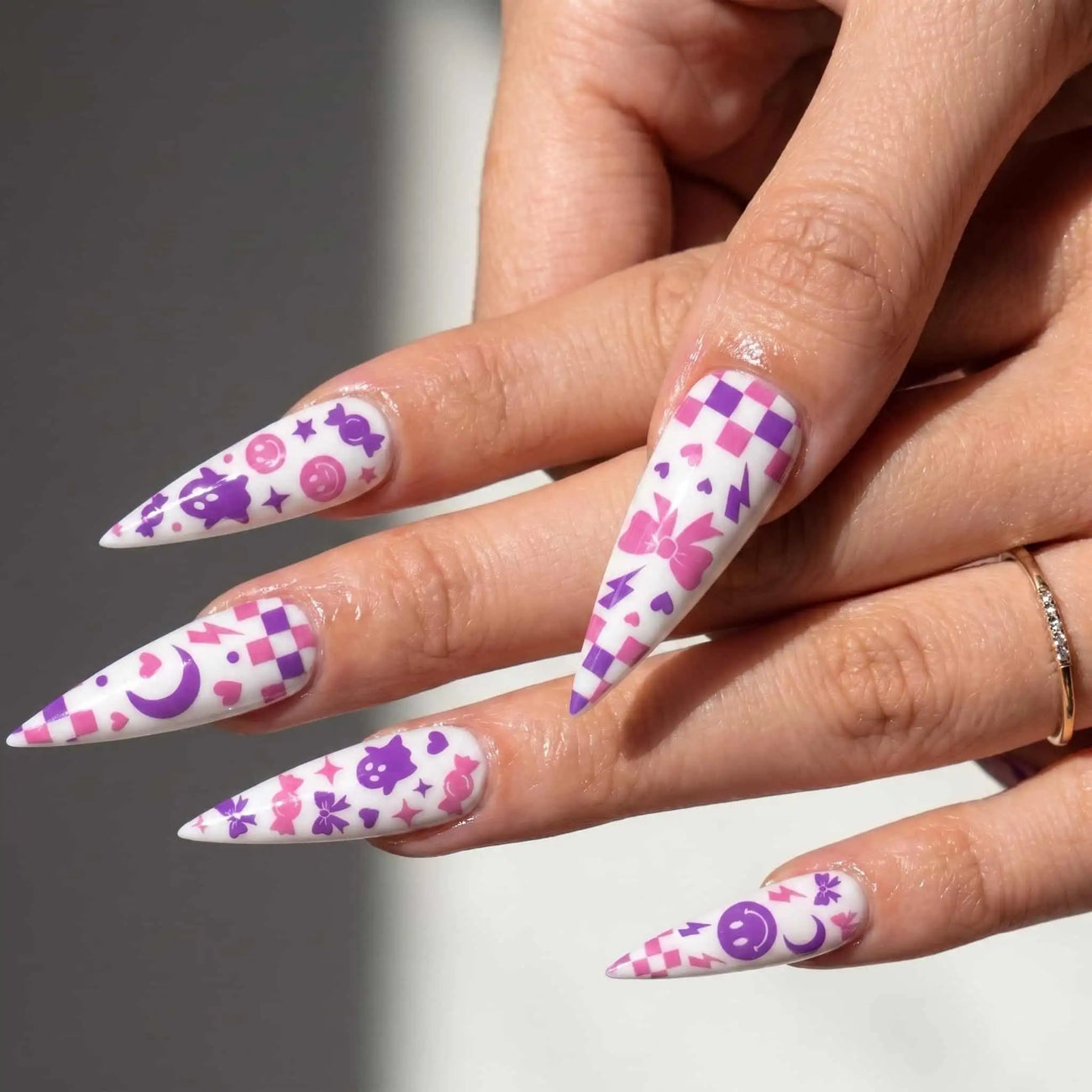 pink checkerboard, ghost, and moon halloween press on nails detail, handmade glossy finish
