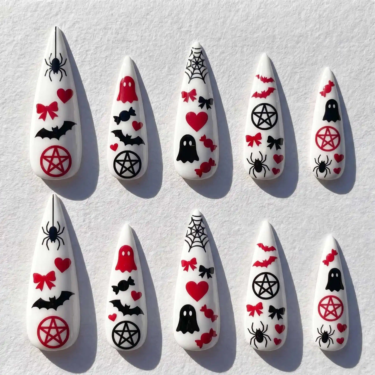 red hearts, bows, bats, and pentagrams halloween stiletto press on nails — spooky season design