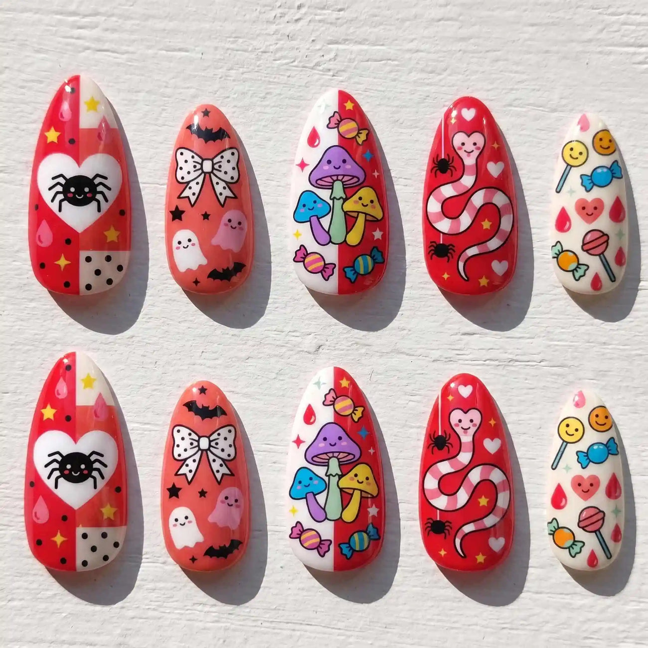 red spooky characters, bows, and spiders halloween almond press on nails — spooky season design