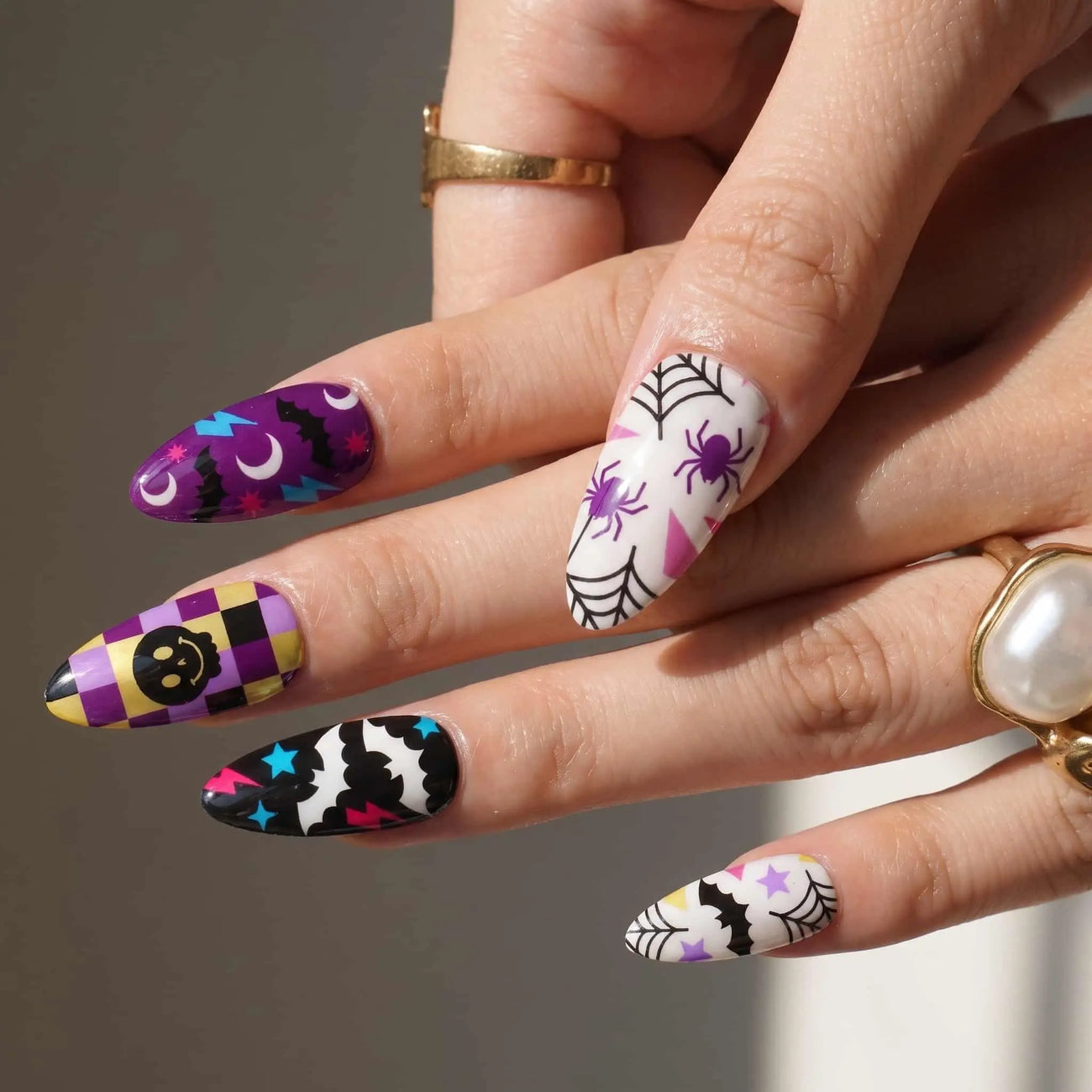 halloween almond press on nails worn look, smiley face and spider web