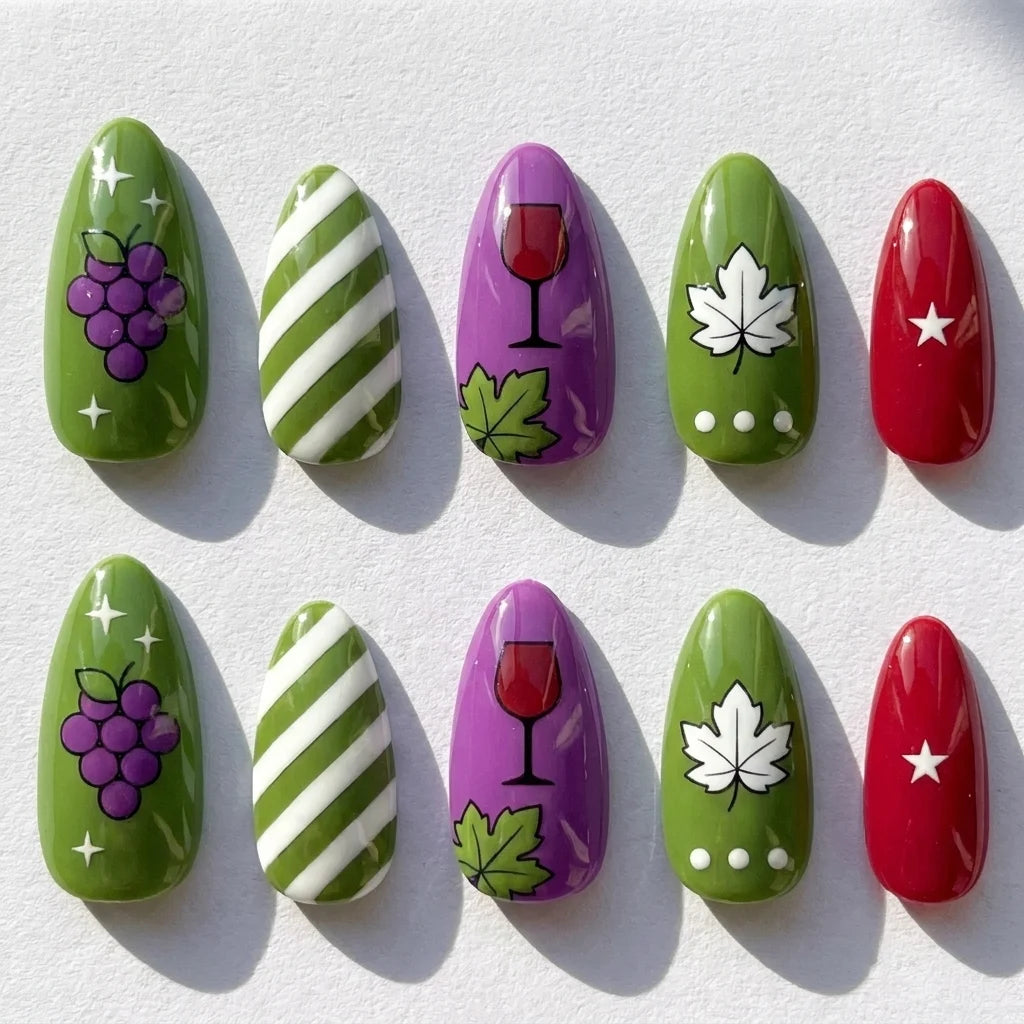 Vineyard Mix short almond press-on nails — grape, wine glass, maple leaf, and striped art
